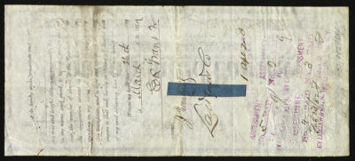 Backside shows various legal language including purple stamps, signatures, and dates