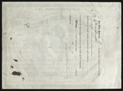 Backside shows various legal language including signatures and dates