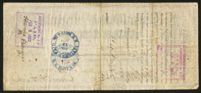 Backside shows legal language and signatures with space for dates and amounts and two blue, two purple stamps